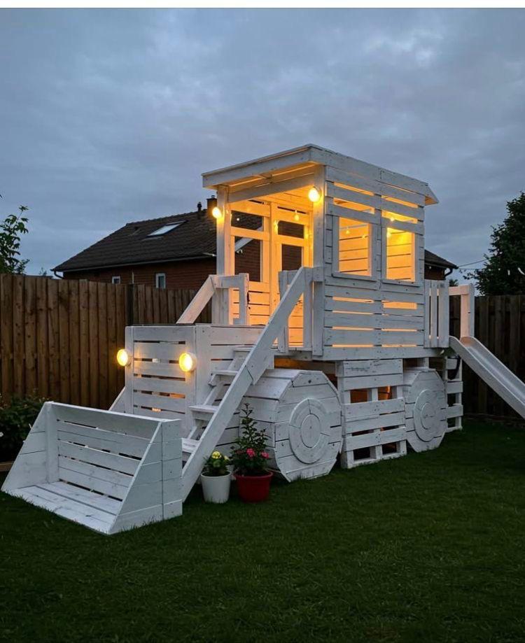 Pallet tractor-style playhouse with slide