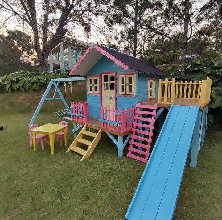 Multi-level kids playhouse with slide and swing
