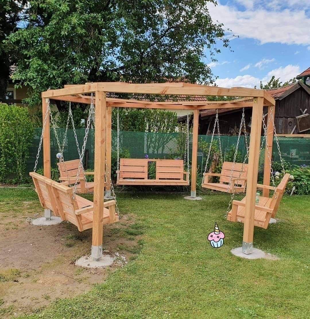 Wooden pergola swing set with four hanging bench swings