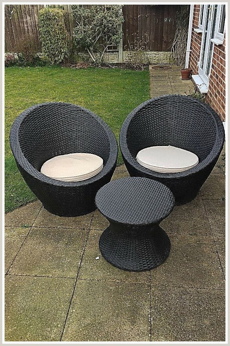 Black Rattan Bowl Chairs with Cream Cushions