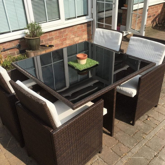 Black Rattan Dining Set with Glass Table and White Cushions
