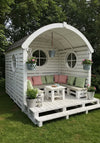 Arched Roof Pallet Cabin with Round Windows