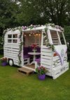 Retro Pallet Camper Van Playhouse with Flower Garland (10 x 10 ft)