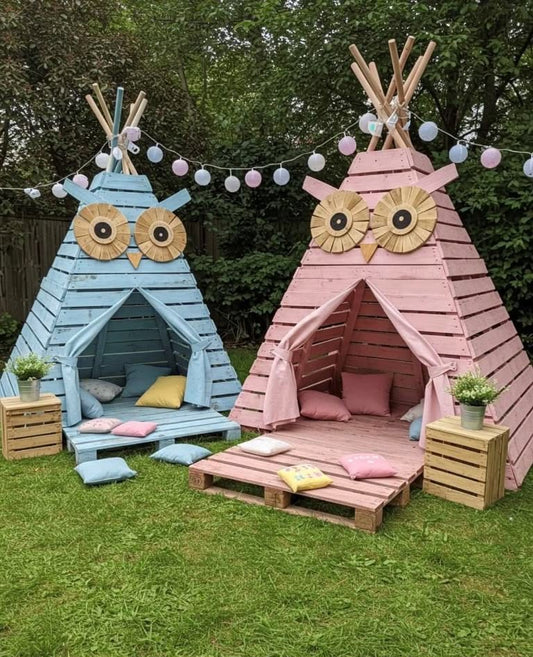 Blue and pink owl-faced pallet teepee playhouses with cushions