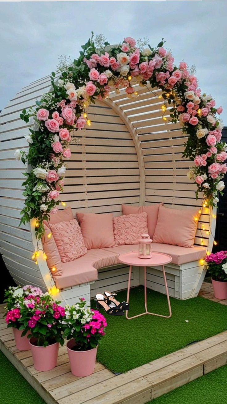 Floral Arch Pallet Daybed Nook with Pink Cushions