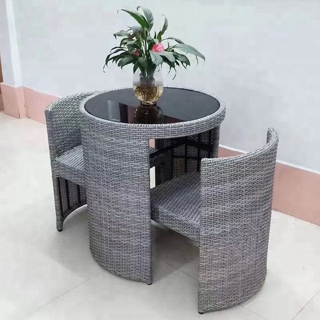 Grey Rattan Chairs with Round Black Glass Table