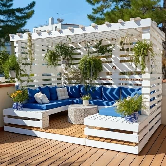 White Pallet Terrace Pergola Lounge with Blue Cushions