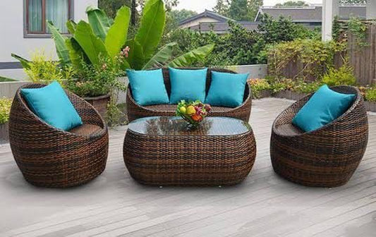 Brown Rattan Oval Sofa Set with Turquoise Cushions